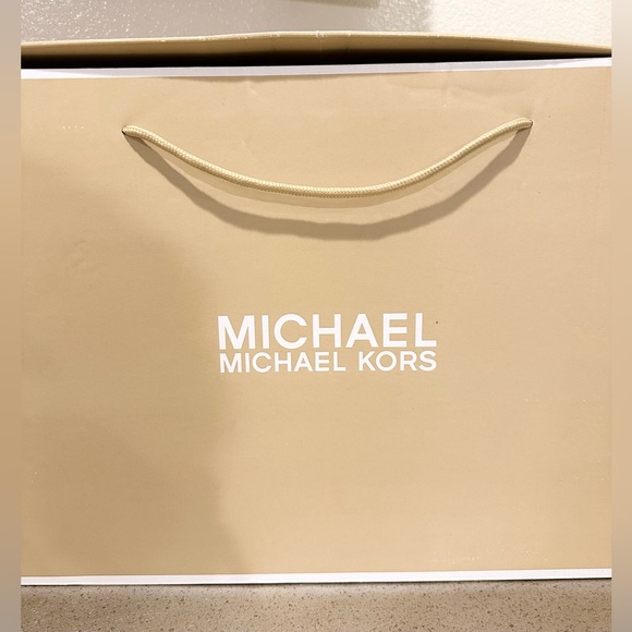 MICHAEL Michael Kors Brown Monogram Embossed Leather Tall Leather Boot - Picture 5 of 10